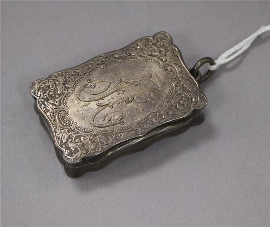 A late Victorian engraved silver vinaigrette, Colen Hewer Cheshire, Birmingham, 1887, 55mm.